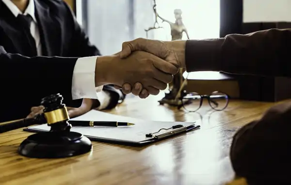 traffic ticket lawyer in London Ontario congratulating client after winning case